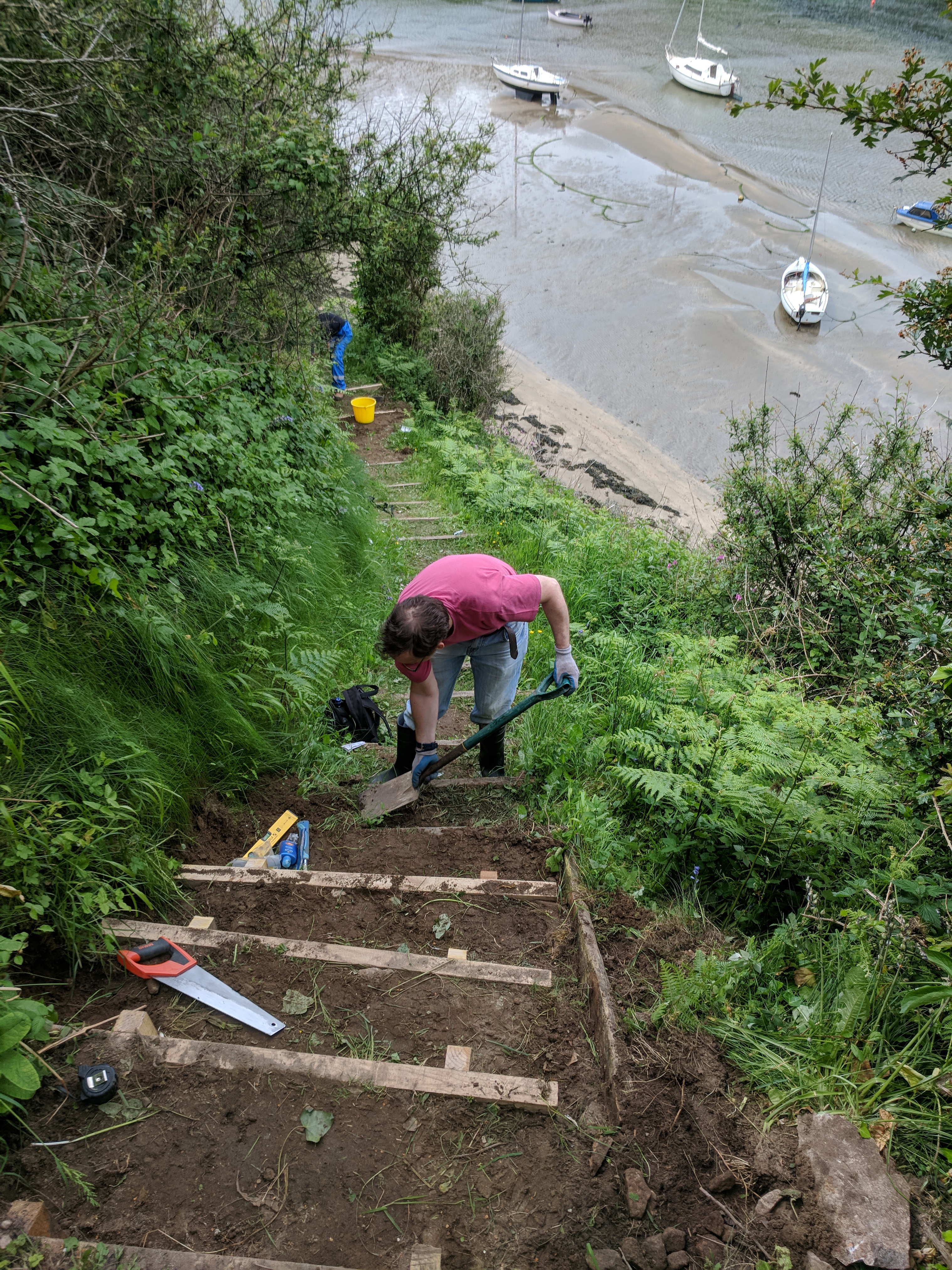 Pathways volunteers installing steps at Solva Harbour