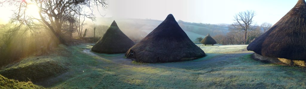 Iron age round houses on a winter morning 